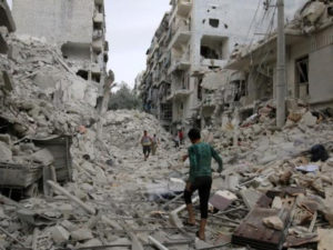 People inspect a damaged site after airstrikes on the rebel held Tariq al-Bab neighbourhood of Aleppo, Syria September 23, 2016. REUTERS/Abdalrhman Ismail